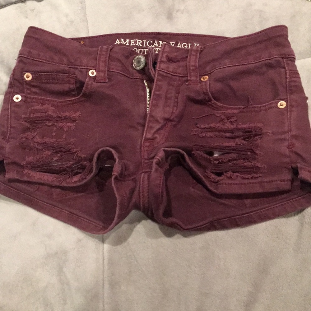 Maroon ripped shorts